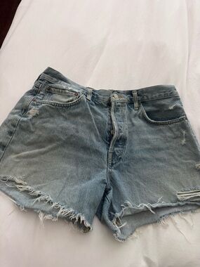 Agolde women’s Parker Long Light Blue Distressed Denim Shorts